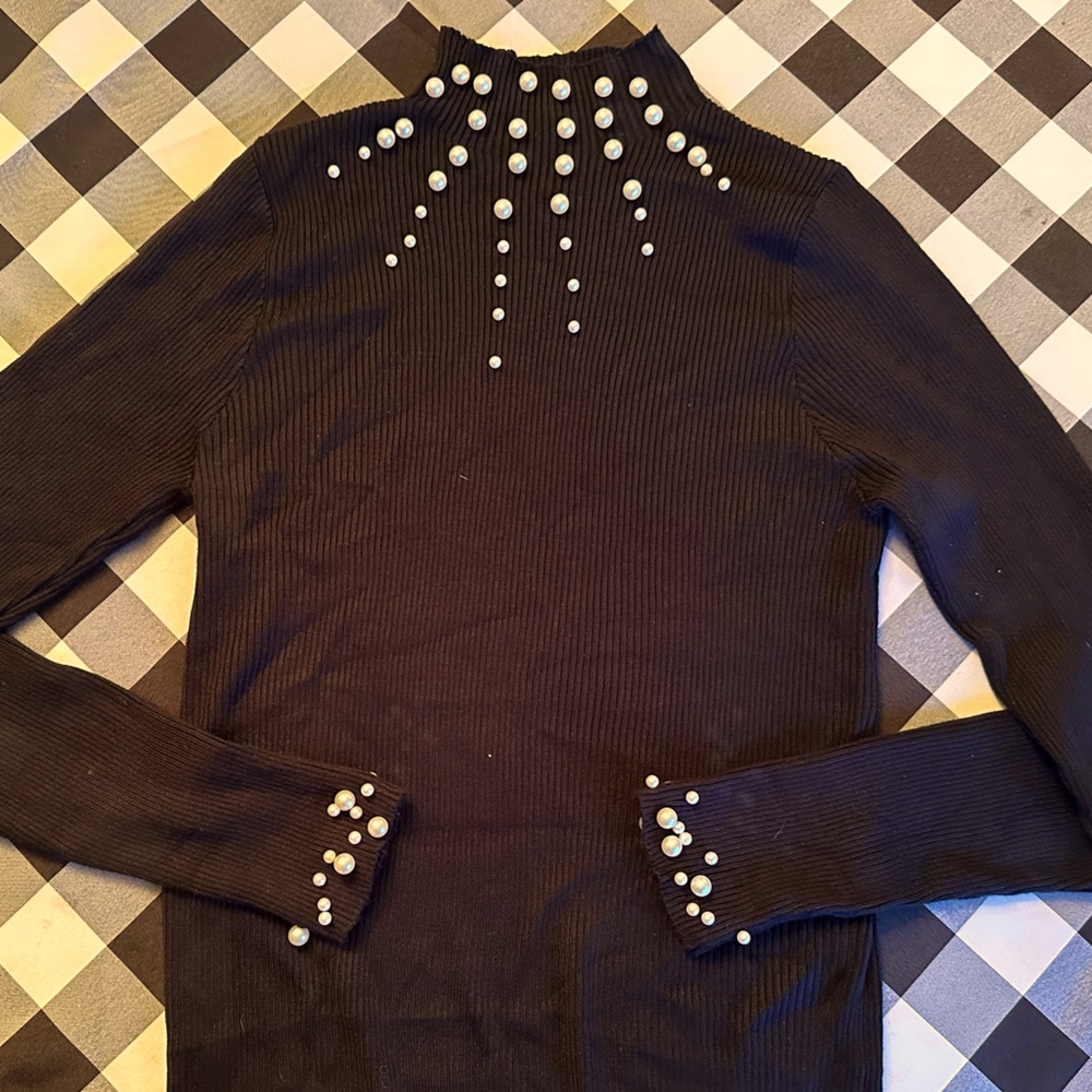 Black long sleeve shirt with pearl embellishments
